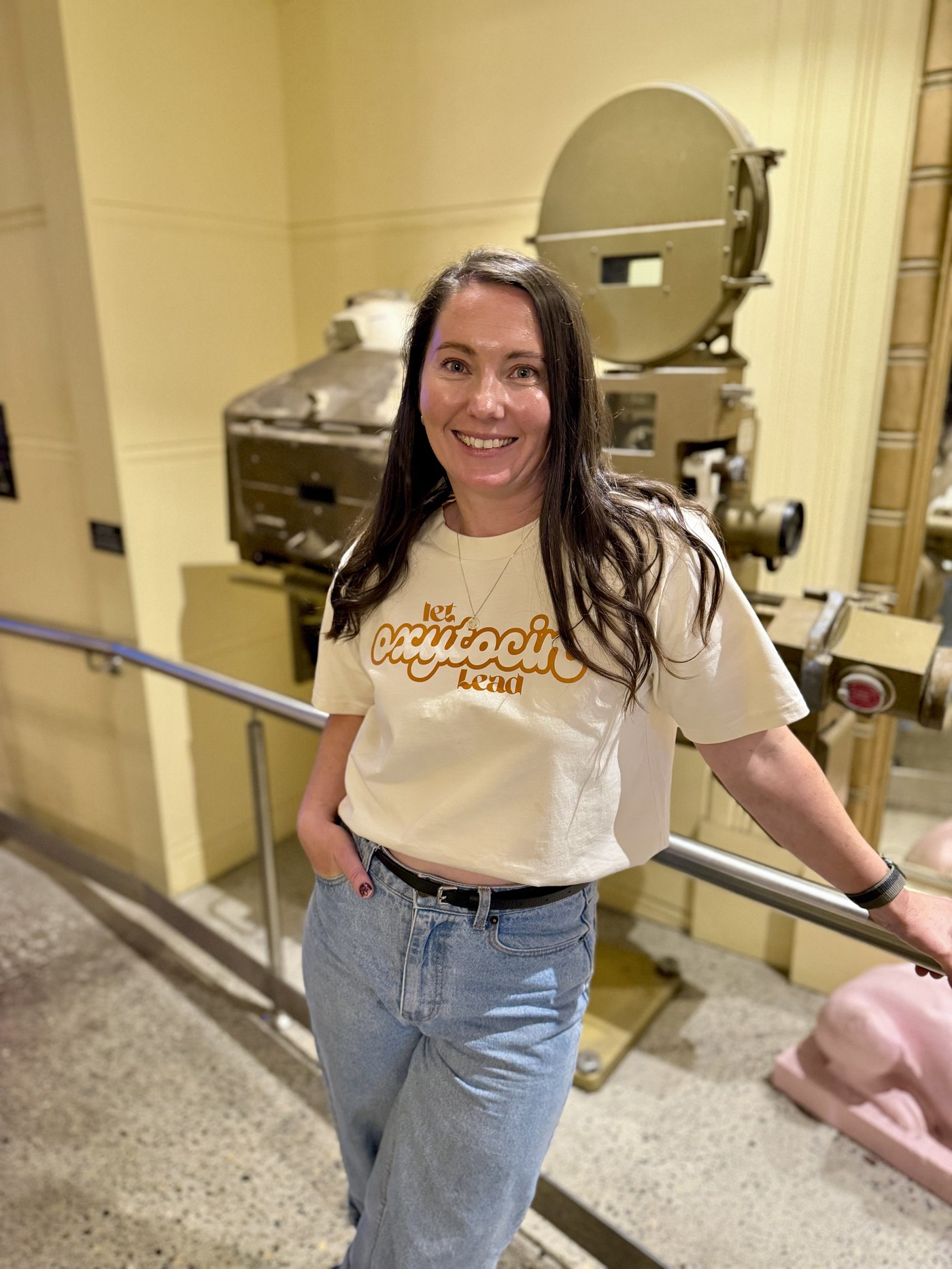 Let Oxytocin Lead unisex T-shirt worn at a cinema screening